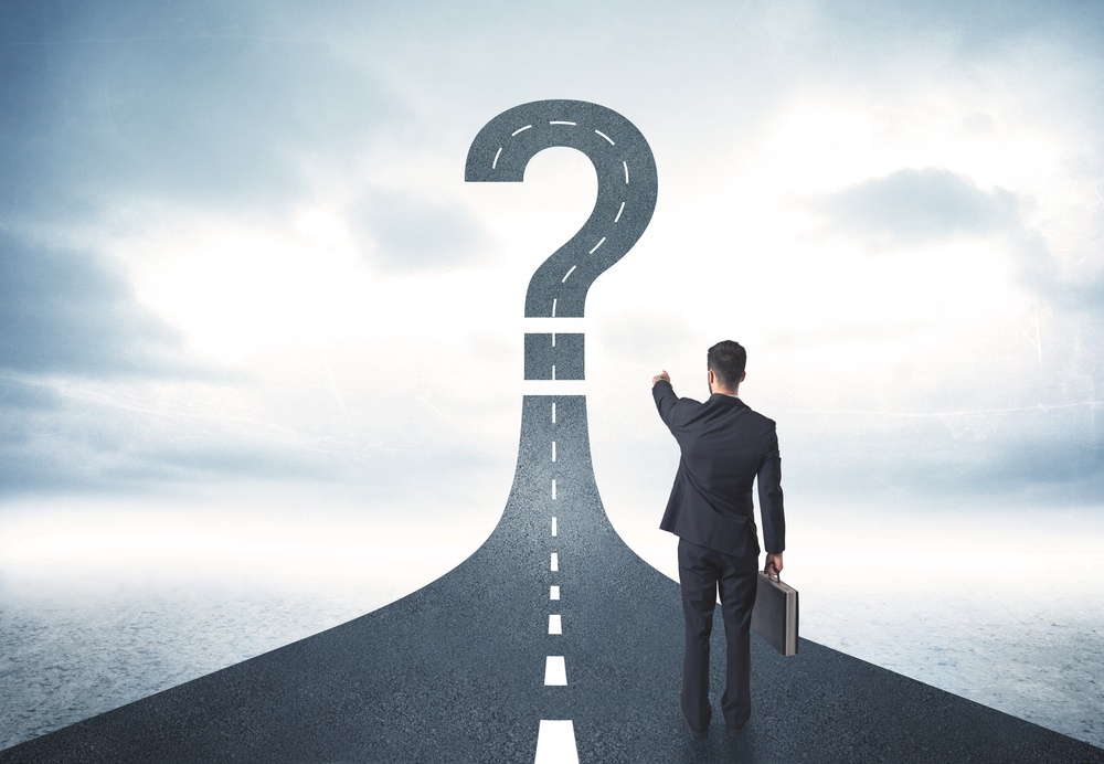 Business Person Lokking At Road With Question Mark Sign Concept